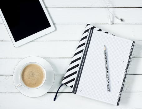 an organized workspace with a calendar and planner