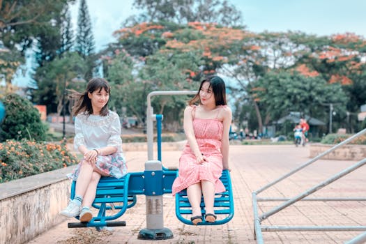 a balanced seesaw with a person on each end