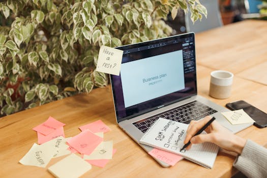 A writer brainstorming with sticky notes