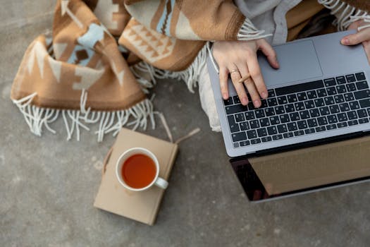 Freelancer relaxing with a good book and a cup of tea