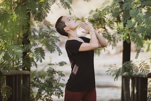 person meditating outdoors